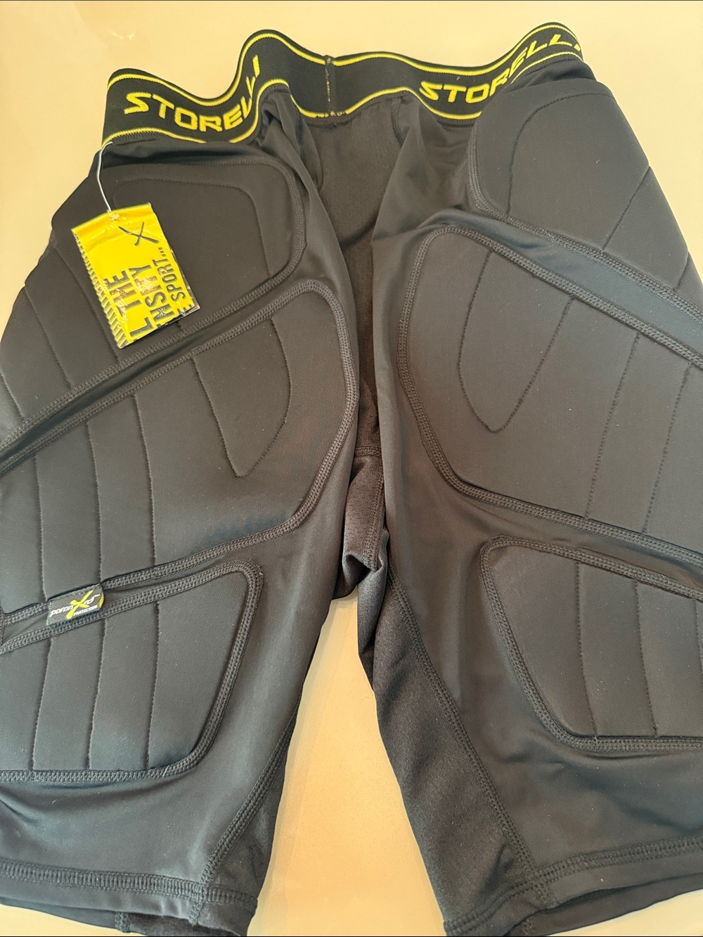 STORELLI Padded Compression Shorts in Black with Yellow Trim